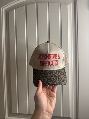 Beige Cap with Red 'EXPENSIVE & DIFFICULT' Text and Leopard Brim